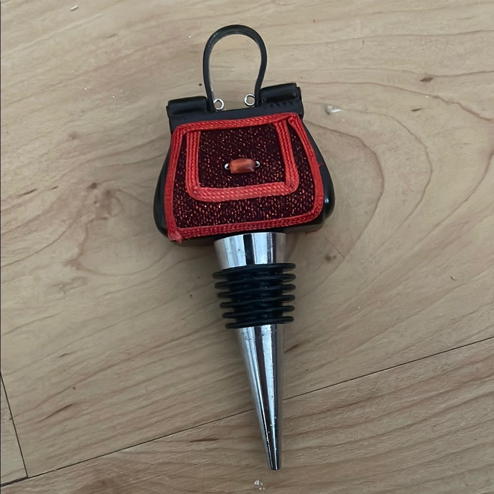 Red and Silver Wine Bottle Stopper